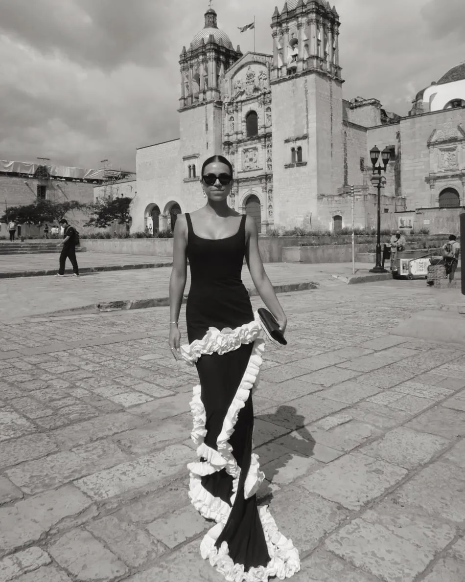 NBD rosette-trim gown, black and white editorial